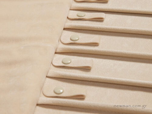 Ivory suede with sections and button