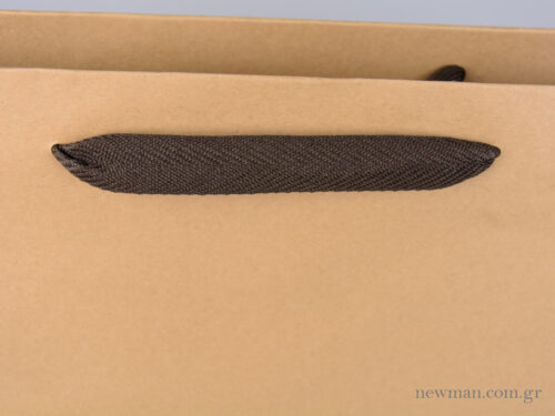 Kraft paper bag with herringbone ribbon handle in brown --details