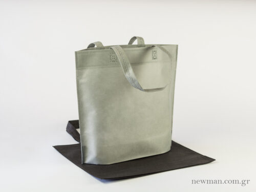 Non woven bag 35x30 cm with 10cm wide bottom and a loop handle.