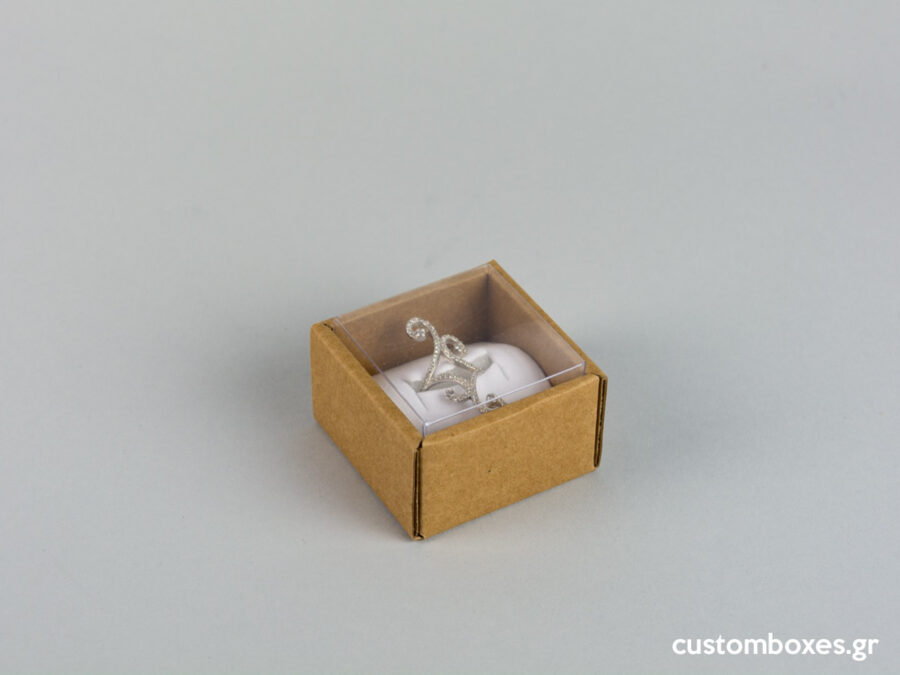 Οικολογικό κουτί kraft με διάφανο καπάκι και άσπρη βελούδινη βάση μικρό δαχτυλίδι