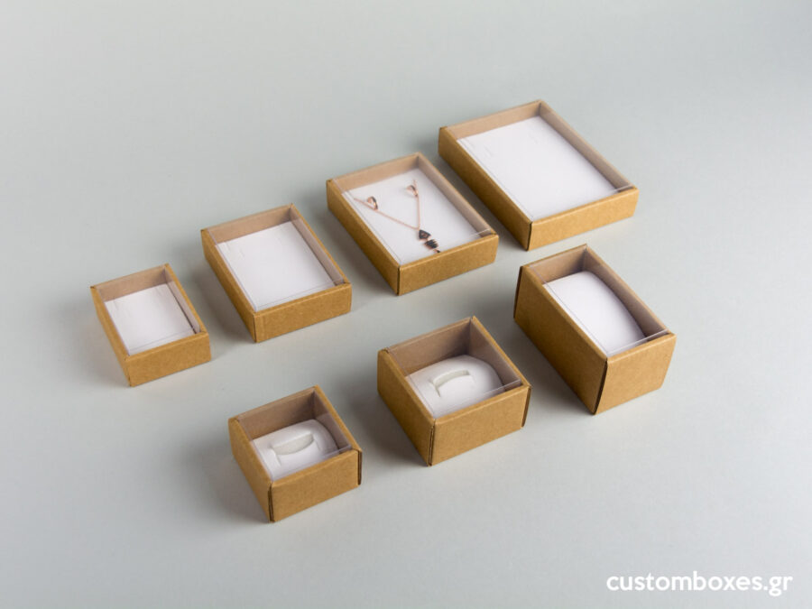 Eco-friendly jewellery boxes with white velvet inserts and transparent lids available in 7 sizes.