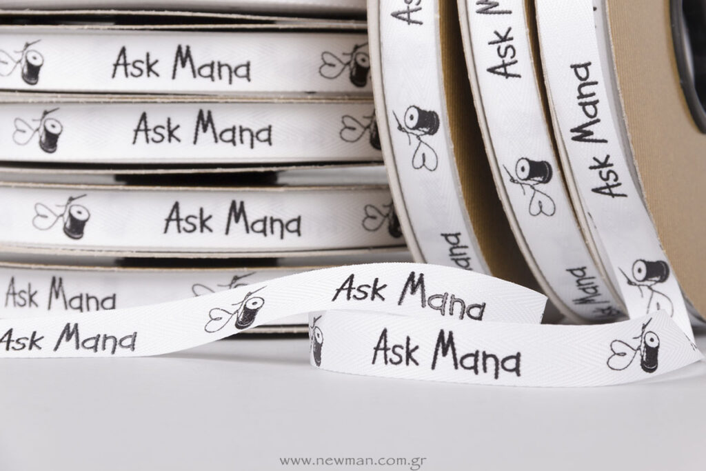 Ask Mana logo on fishbone ribbon