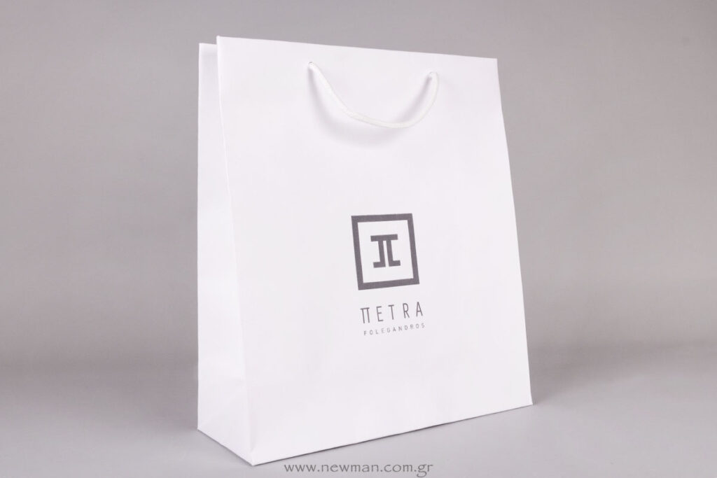 Petra logo on white paper luxury bag