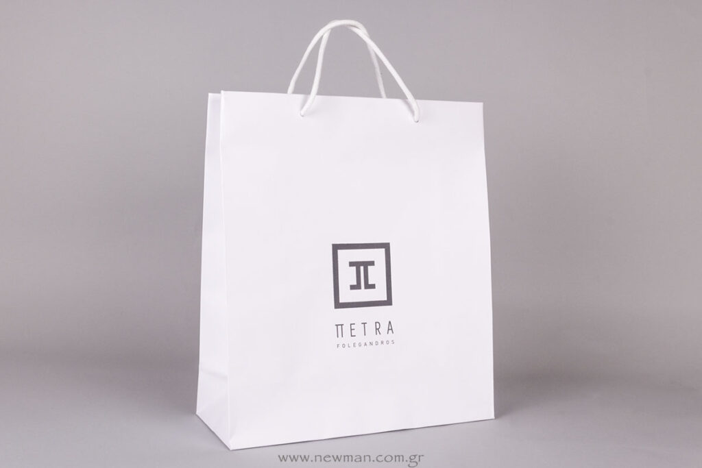 Petra logo on white paper luxury bag