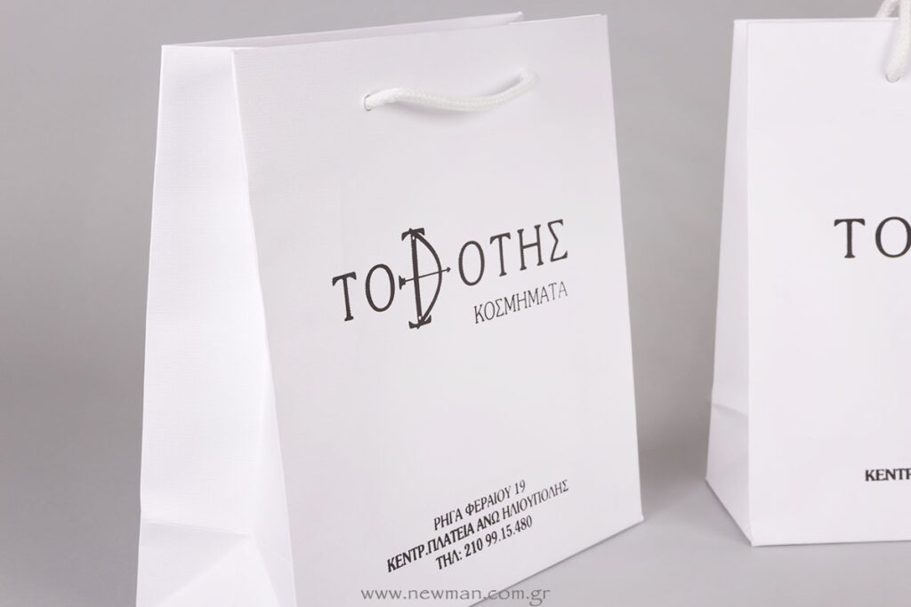White luxury paper bags with black logo 