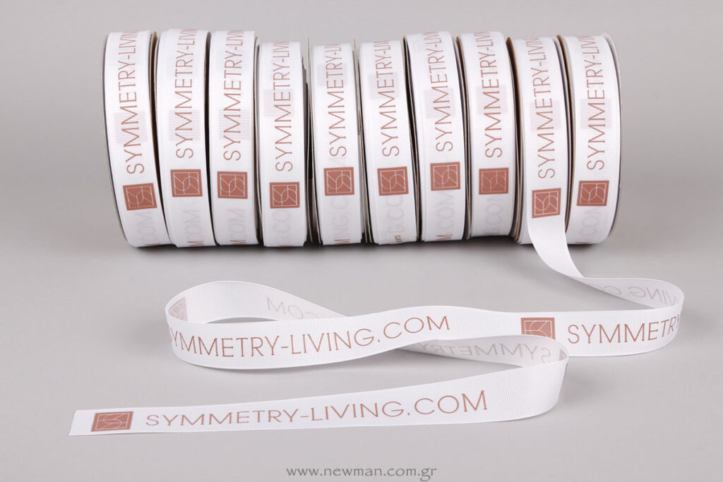 Symmetry.living.com logo printed on ribbon
