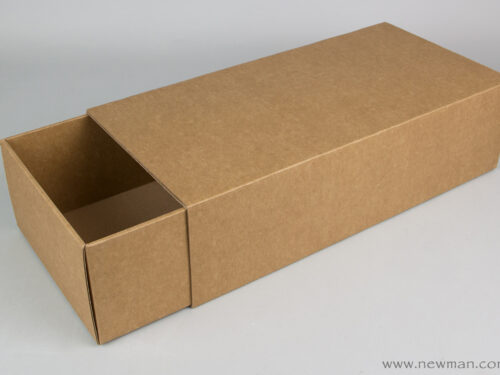 These matchbox-type paperboard boxes for bottles are available in kraft natural color palette.