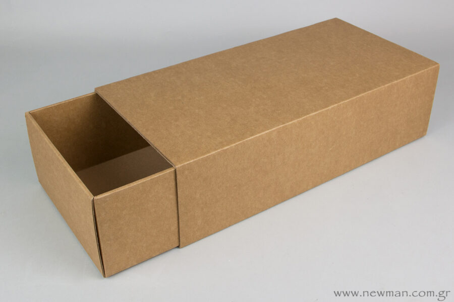 These matchbox-type paperboard boxes for bottles are available in kraft natural color palette.