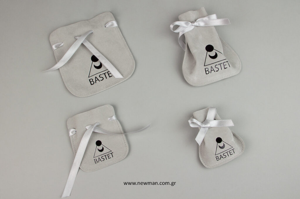 Suede jewellery pouches-cases with printed logo.