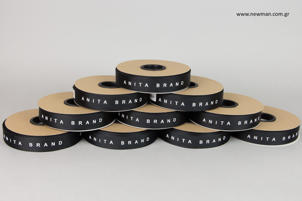 Printed packaging ribbons with Newman signature.