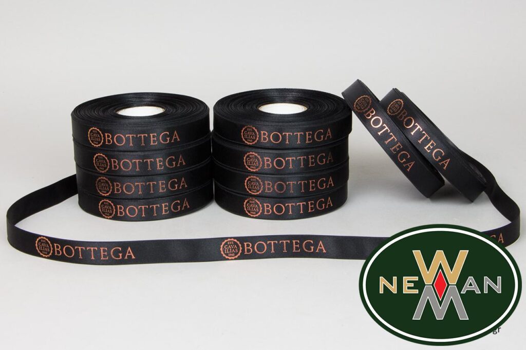 Double-faced satin ribbon with bronze print.
