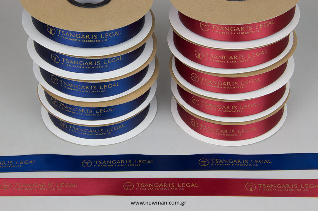 Luxury ribbons from satin, with mat gold embossed letters.