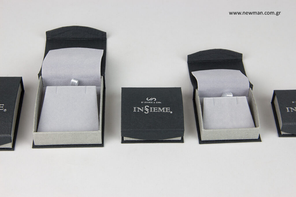 Boxes for crosses and earrings with corporate logo printing.