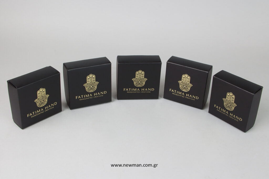 NewMan bijoux boxes with printed logo.