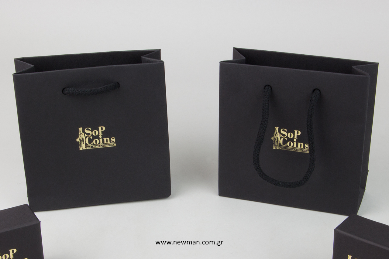 Luxury gift bags with gold print.
