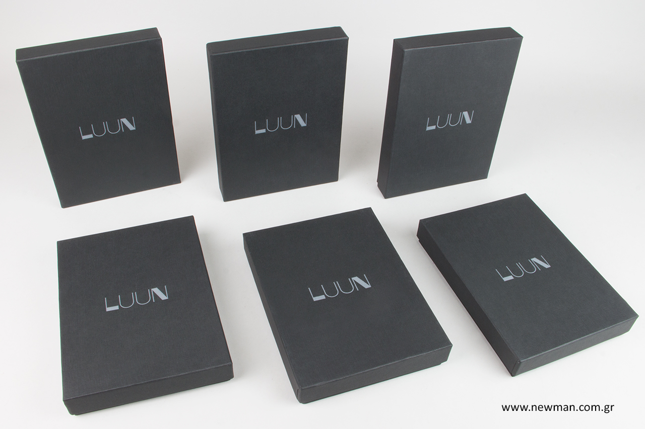 Branded boxes with corporate logo.