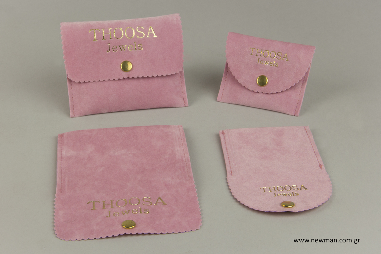Pouches for jewellery with gold hot-foil printed logo.