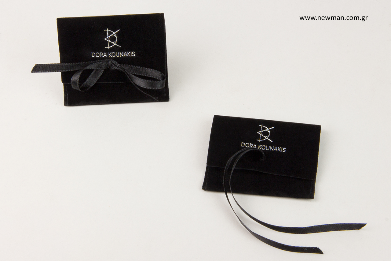 Suede jewellery pouches with printed logo.