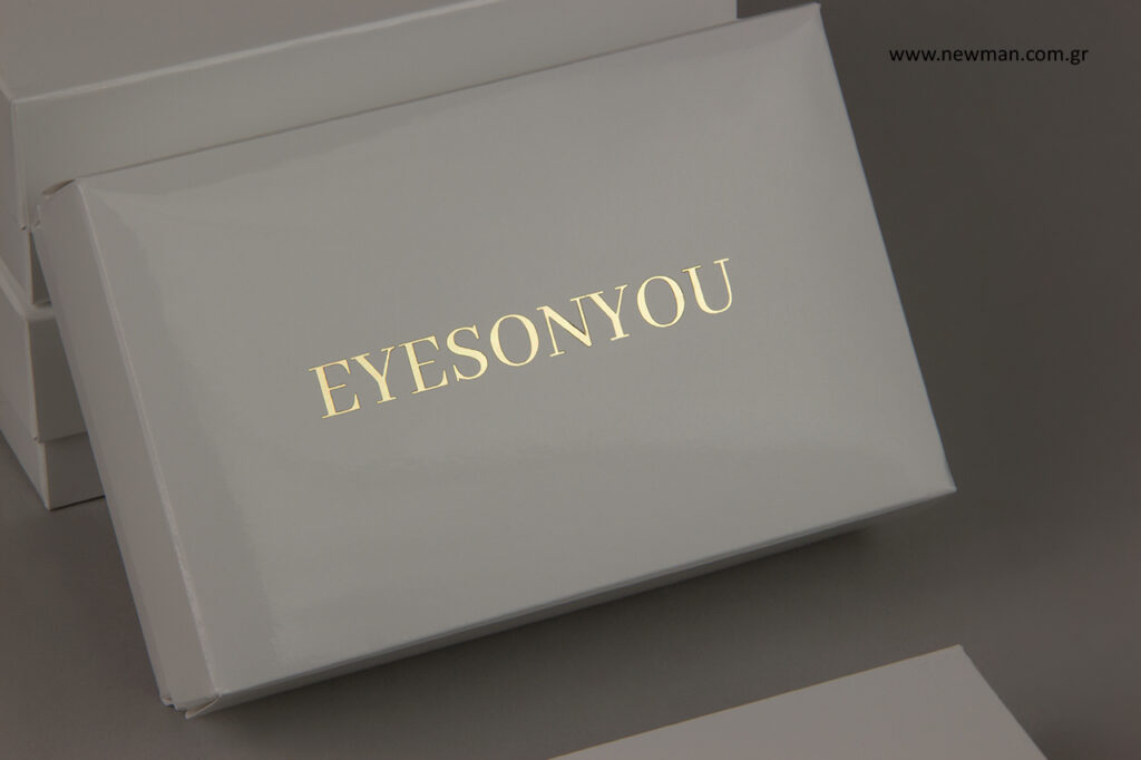 EYESONYOU: Gold hot-foil printing on packaging boxes for bijoux.