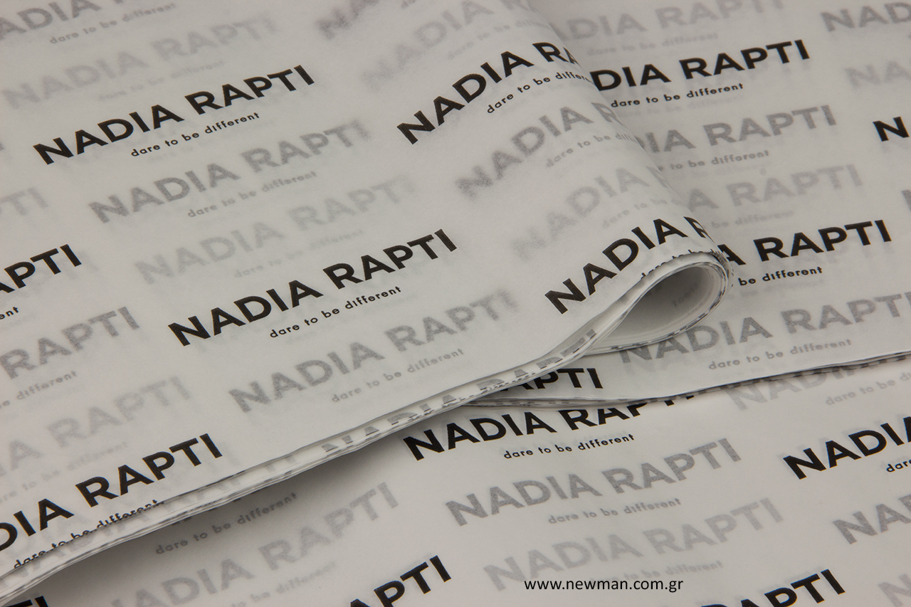 Nadia Rapti: Printed tissue paper with brand name.