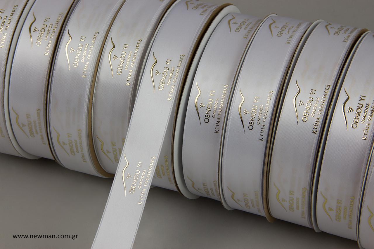Satin ribbons with corporate brand name.
