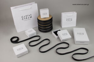Caviar Cream: Printed NewMan packaging stuff.