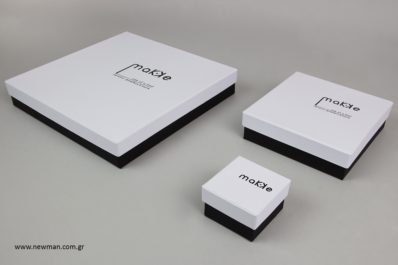 Rigid boxes from paperboard with hot-foil print.