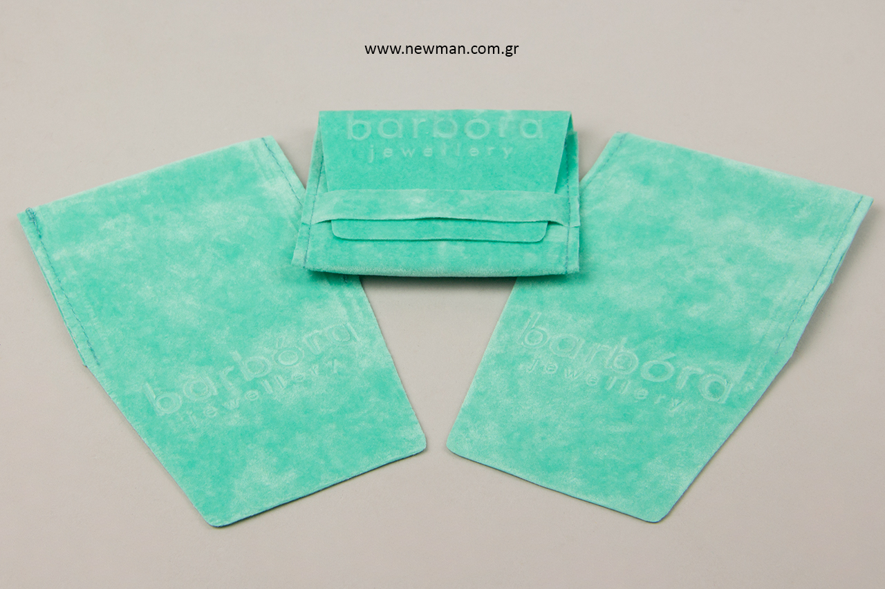 Turquoise printed suede pouches.