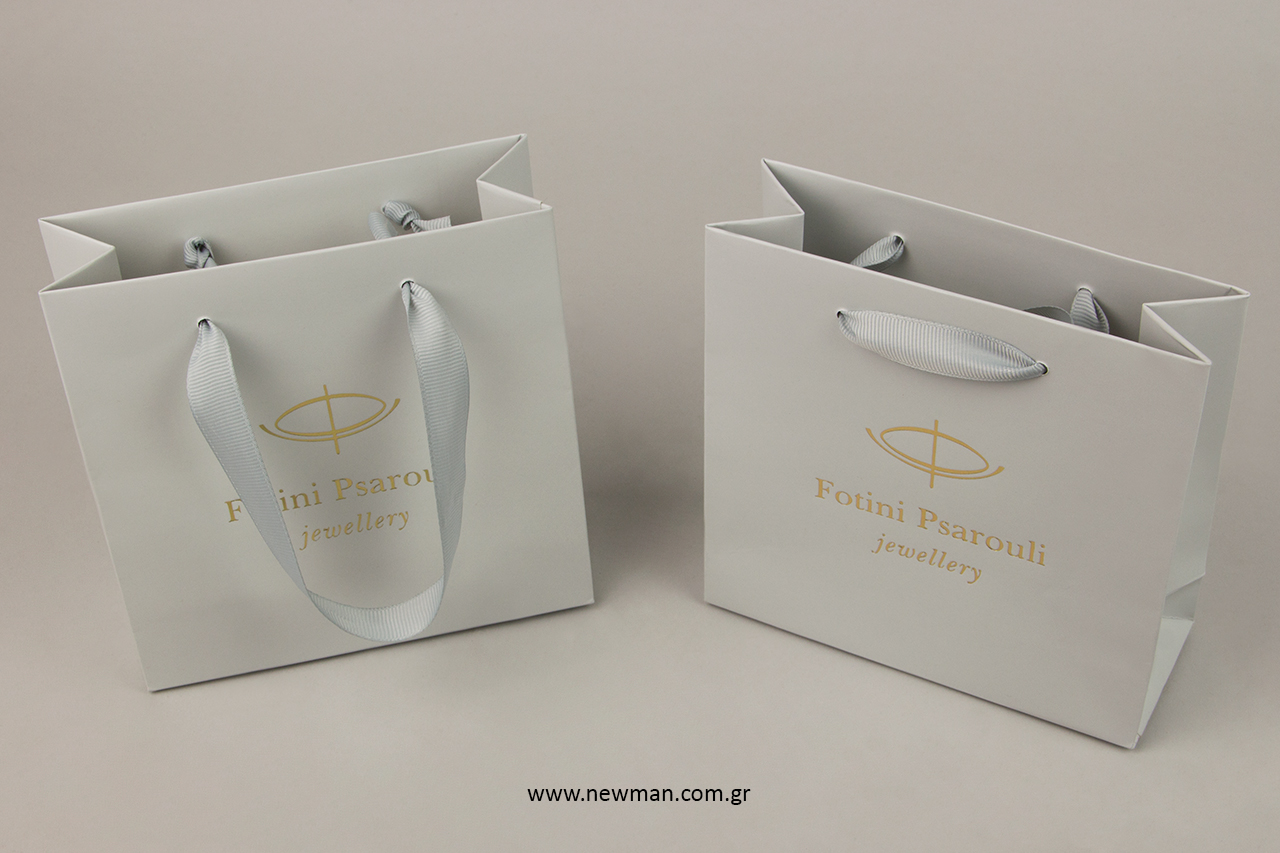 Branded carrier bags with logo printing.