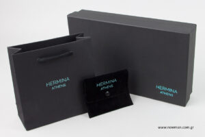 Hermina Athens: NewMan packaging for jewellery with turquoise hot-foil printing.