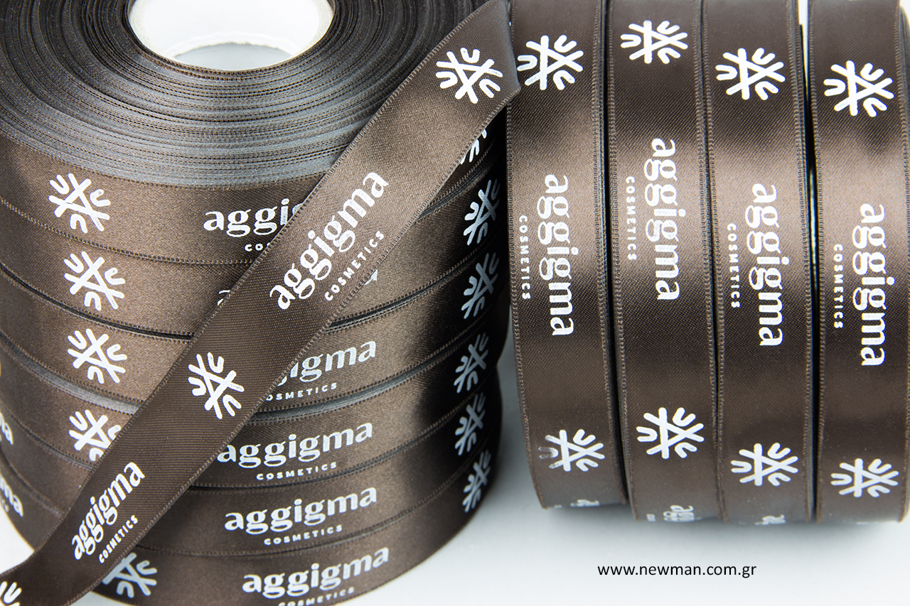 Double-sided satin ribbons with white hot-foil printing.