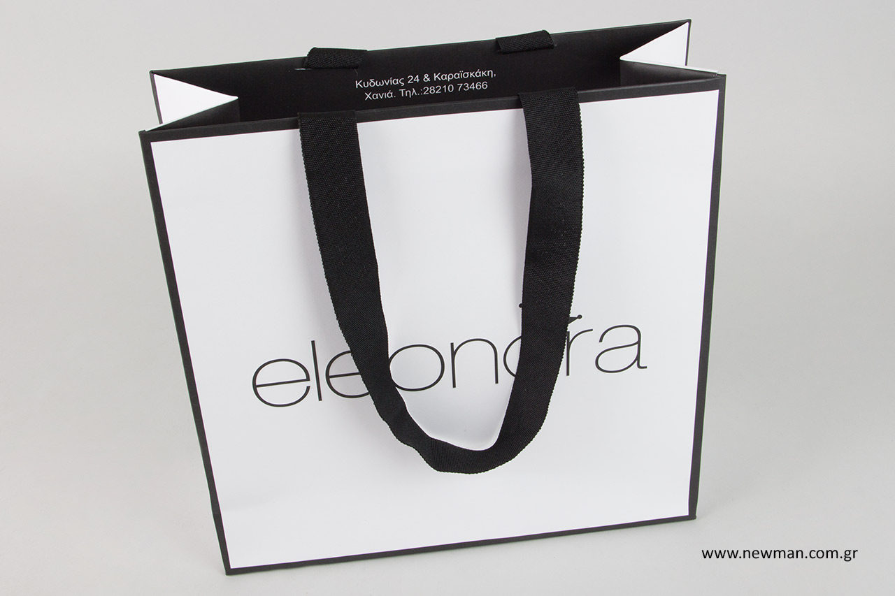 Carrier bags with ribbon hidden handle.