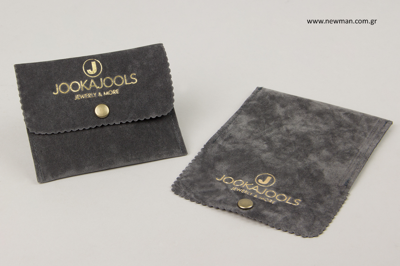Gold hot-foil printing on jewellery pouches.