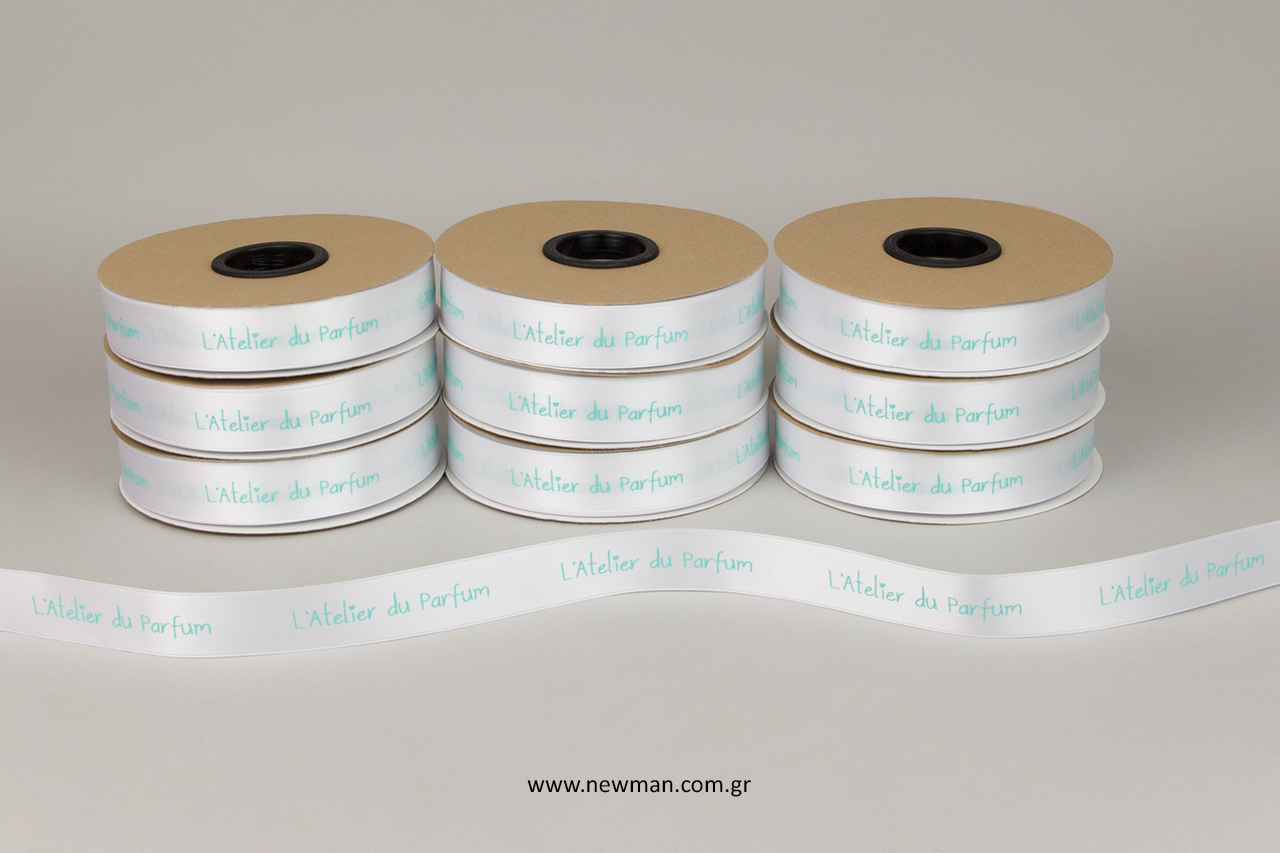 White luxury satin ribbons with turquoise embossed logo printing.