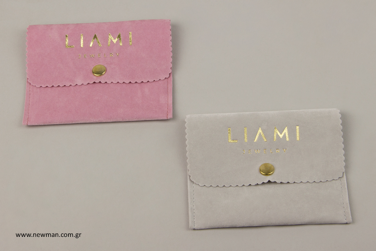 Suede pouches for jewellery with logo.