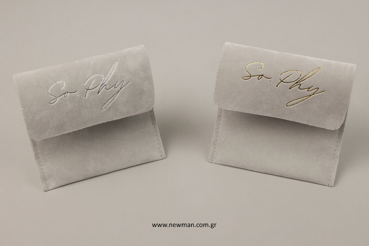 Gold and silver hot-foil printing on packaging pouches.