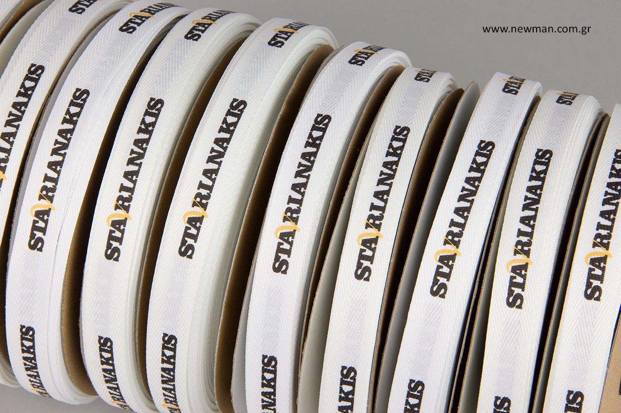 Double-sided branded fishbone ribbons with print.