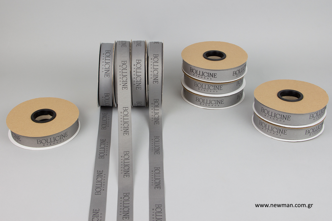 Packaging grosgrain ribbons with embossed printing.
