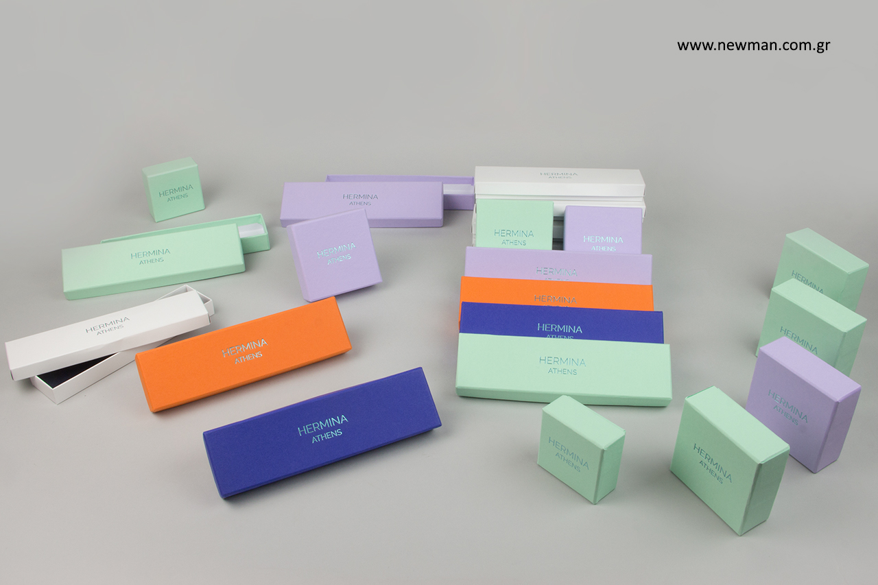 Printed packaging boxes in various colors.