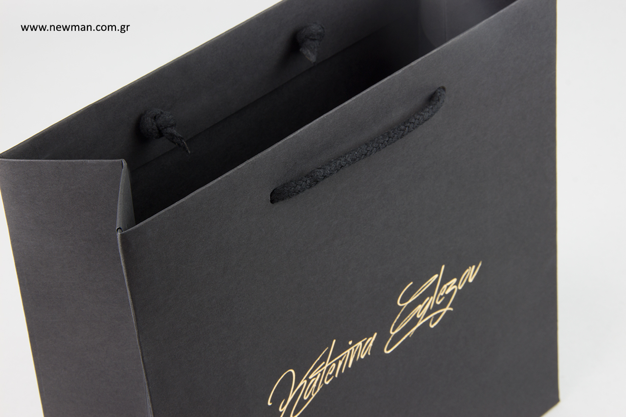 Gold hot-foil printing on luxury paper bags.