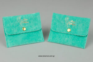 Chica & Melon: NewMan suede pouches with gold logo printing.