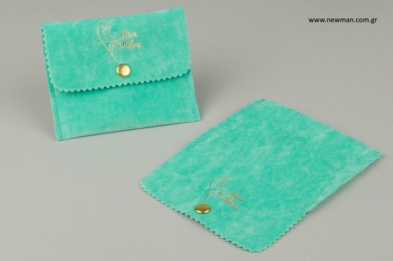 Gold hot-foil printing on branded jewellery pouches.