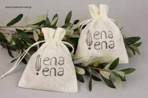 ena ena by Hellenic Fields: NewMan wholesale cloth pouches with logo printing.