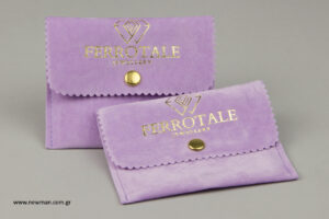 Ferrotale jewellery: Gold hot-foil printing on suede jewellery pouches.