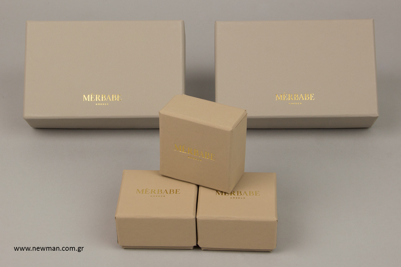 Handmade packaging boxes made of specialty paper.