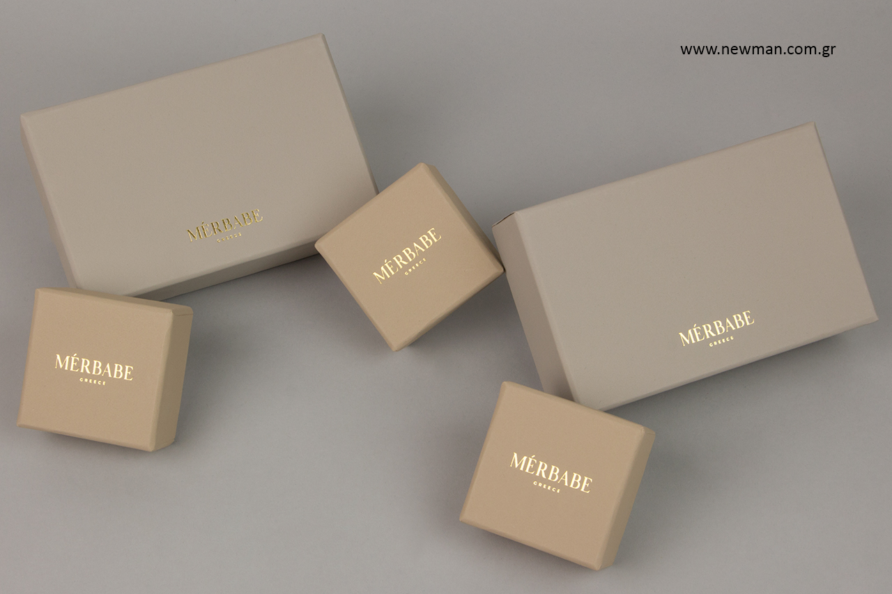 Gold hot-foil printing on jewellery boxes.