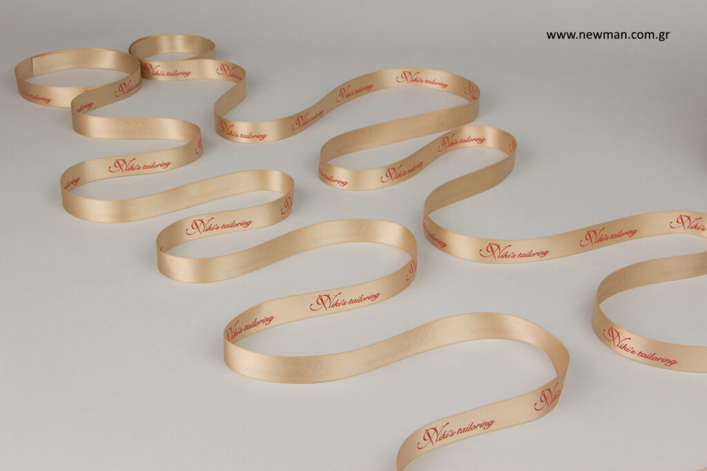 Niki's tailoring: Logo printing on ribbons for sewing items.