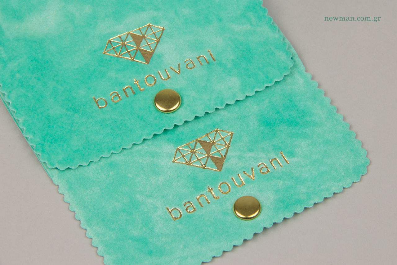 Packaging jewellery pouches with logo.