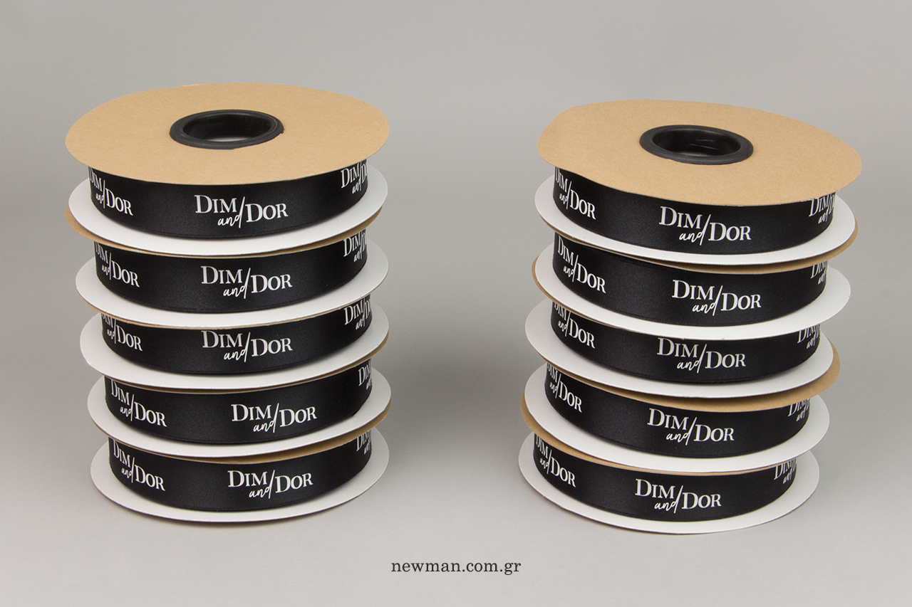 Corporate brand name on double-faced satin ribbons.
