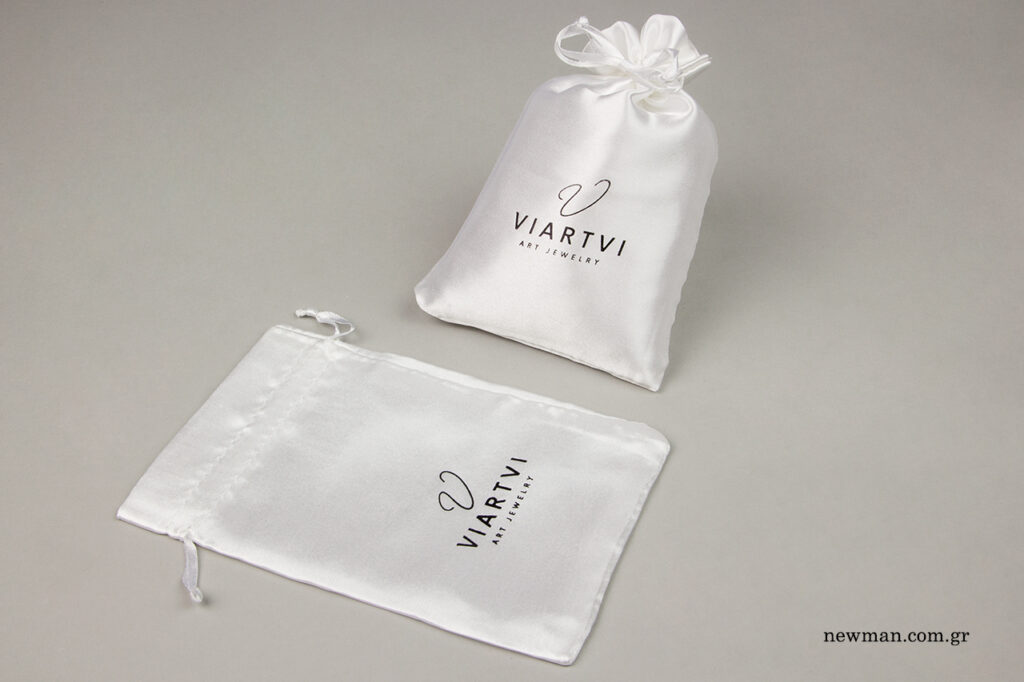 Viartvi: Wholesale satin branded pouches with hot-foil printing.